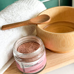 Calm Rose Soothing Mask with a bamboo spoon and bowl with towel for a facial mask
